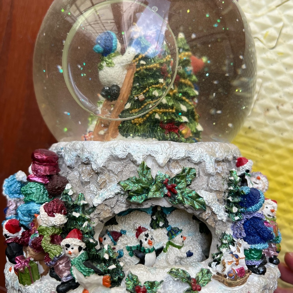 Festive Snow Globe with Colorful Holiday Scene